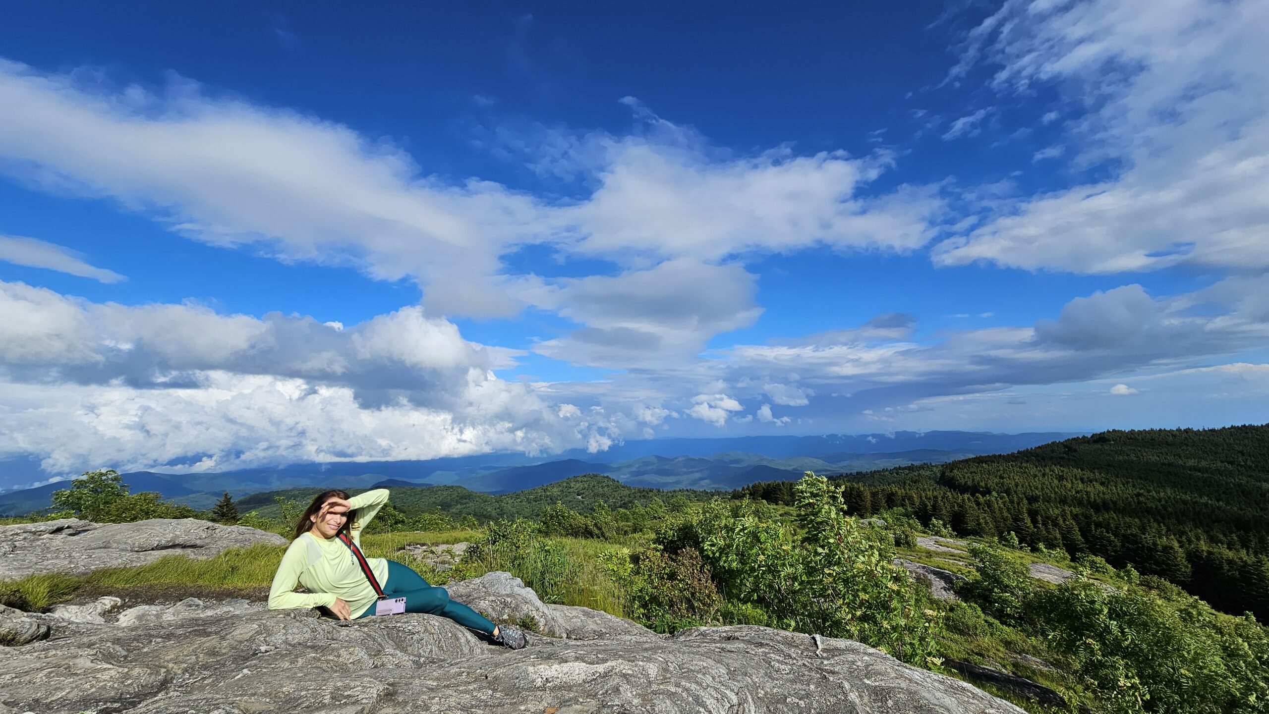 Relaxing on the rocky summit of Black Balsam Knob with panoramic Blue Ridge Mountain views