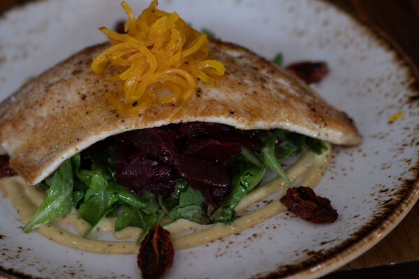 Plated heritage trout dish at Singletree Heritage Kitchen
