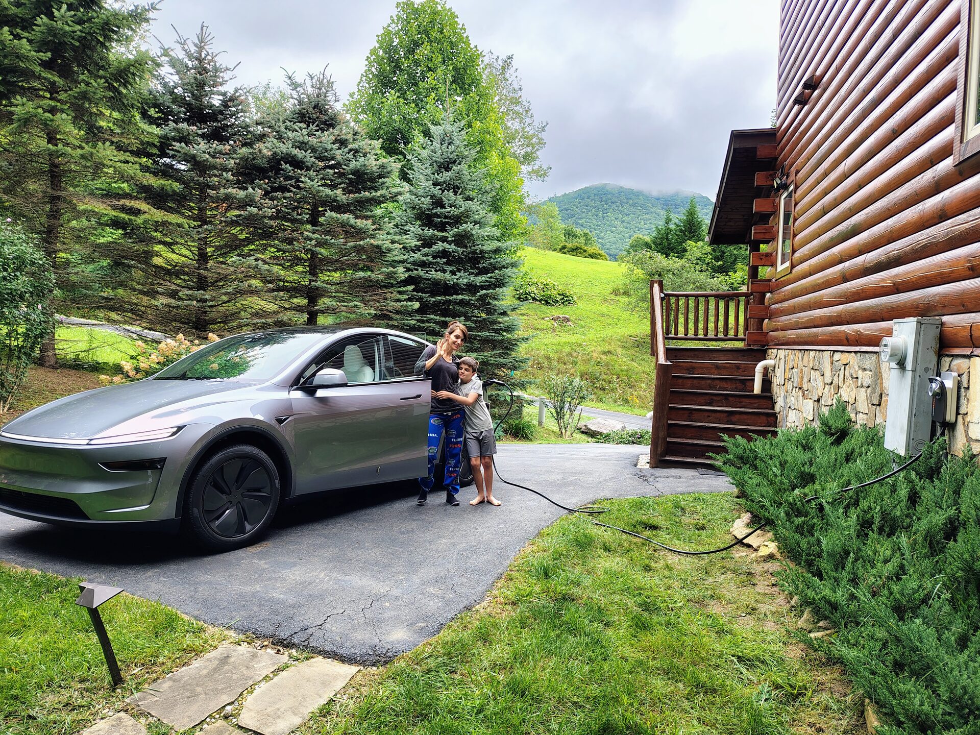 Mountain view from Smoky Mountain Dream cabin driveway in Waynesville NC with EV charging station